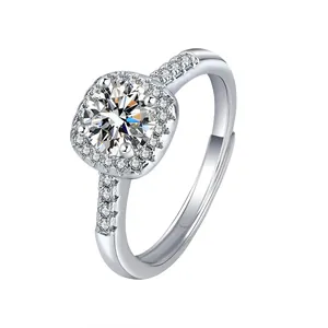 Detailed shot of a luxury square halo ring featuring a sparkling round centerpiece stone.