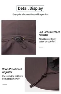Detail view of the adjustable drawcord and windproof buckle on the outdoor fishing hat