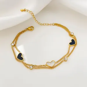 Double-layer 18K gold plated titanium steel bracelet with black and white heart charms