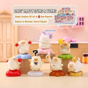 Collection of six cute miniature cat figurines in various poses and accessories.