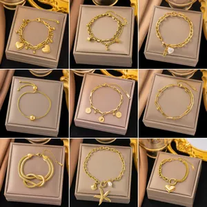 Collection of 18K gold plated titanium steel bracelets in various trendy designs.
