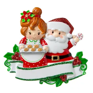 Detailed view of Santa and girl Christmas ornament with blank banner for DIY names