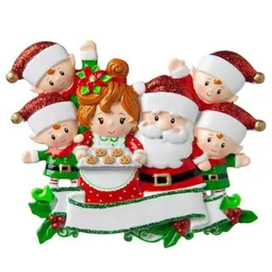Detailed view of acrylic Santa Claus and family Christmas tree ornament