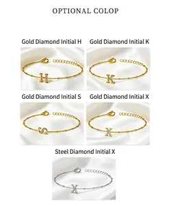 Detailed display of initial letter bracelets in gold and silver with zircon accents