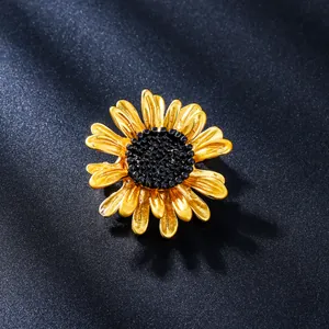 Exquisite close-up of a yellow enamel daisy flower brooch with textured black center