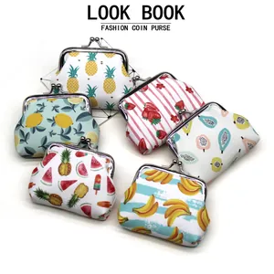 Collection of cute fruit print coin purses with vintage metal clasps.