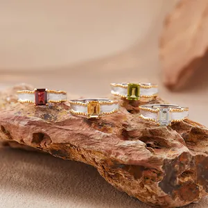 Detailed macro shot of S925 silver rings featuring matte texture and vibrant natural gemstones