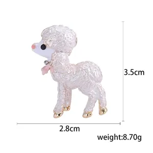 Detail of a cute cartoon sheep brooch, 3.5cm height, white enamel and gold finish.