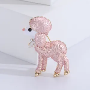 Detail view of a cute pink poodle brooch with enamel oil finish and crystals