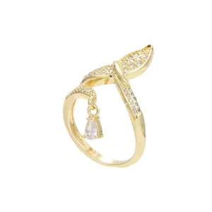Elegant gold-plated fishtail ring with micro-pave zircons and pear-cut stone dangle