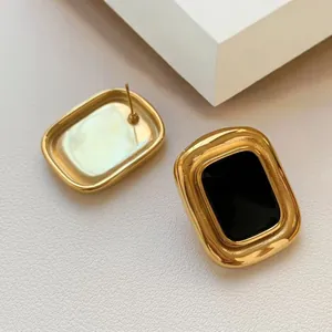 Elegant vintage gold stainless steel stud earrings with black enamel rectangle inlay