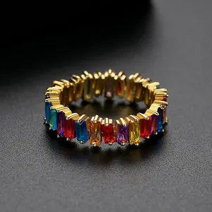 Vibrant rainbow baguette zircon ring in gold claw setting for bold hip-hop street style.