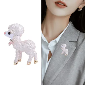 Detailed view of cute cartoon sheep brooch with enamel finish on a grey blazer