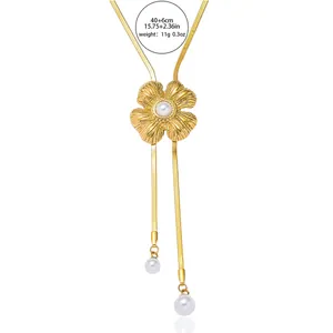 Gold floral tassel necklace with white pearl pendant and adjustable snake chain