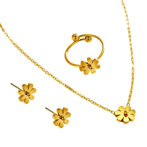 Elegant 18K gold plated titanium steel jewelry set featuring delicate daisy flower designs.