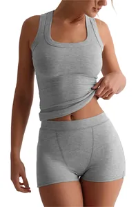 Detail view of a grey ribbed slim-fit tank top and high-waisted shorts set for women.