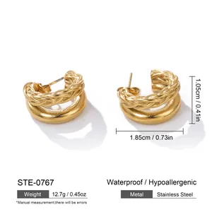 Detail of French style gold braided chunky hoop earrings with size and weight specs.