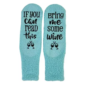 Cozy fuzzy coral fleece socks with funny non-slip 'Bring Me Some Wine' text design
