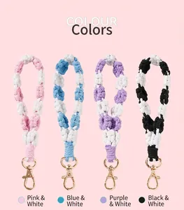 Hand-woven daisy macrame phone wrist straps available in four distinct color options