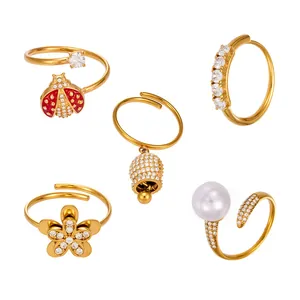 Elegant gold-plated ring set featuring zircon ladybug, flower, pearl and bell designs