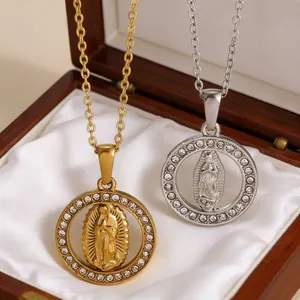 Detailed macro shot of two unique 18k gold and silver plated Virgin Mary portrait necklaces