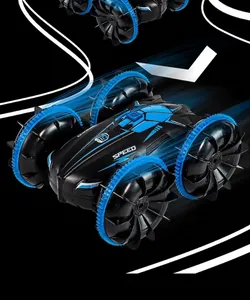 Macro view of blue amphibious RC stunt car with turbine wheels showing motion effects.