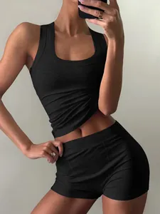 Slim fit black ribbed tank top and high-waist shorts two-piece set for women.