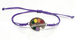 Purple braided wax cord bracelet featuring a colorful artist palette and paintbrush charm