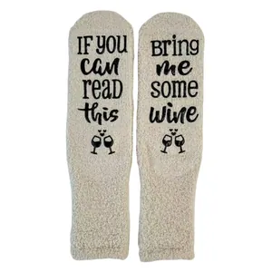 Close-up of funny wine-themed anti-slip letter print on thick coral fleece floor socks