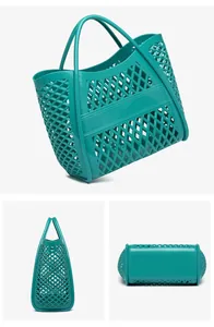 Detaillierte Ansichten einer türkisfarbenen Silikon-Gelee-Tasche mit Gittermuster