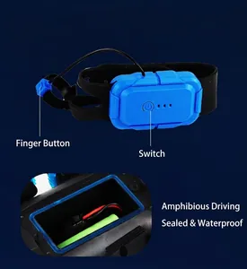 Detail view of the amphibious car's watch remote control and waterproof battery case