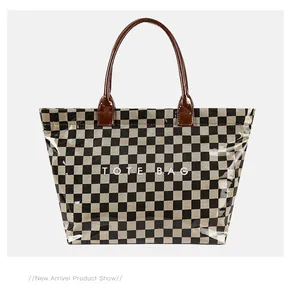 Front view of a retro checkerboard tote bag with a transparent PVC outer layer.