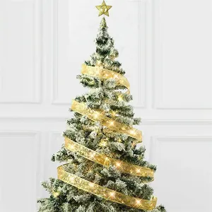 Elegant double-layer golden LED ribbon lights used for festive Christmas tree decoration