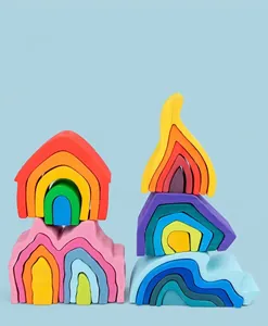 Detail view of colorful wooden stacking blocks representing natural elements like fire and water.