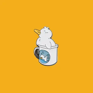 Cute white duck in a mug enamel pin badge detail