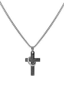 Detail view of a stainless steel cross necklace with engraved Spanish prayer text.