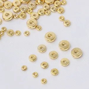 Detailed view of 18k gold plated round wheel spacer beads for DIY jewelry making