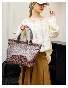 Fashionable leopard print PVC tote bag for women with large capacity and durable handles