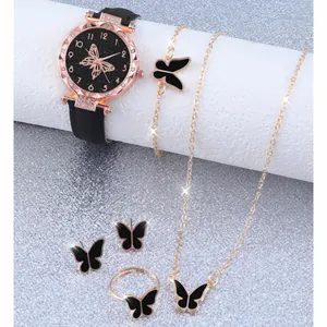 Detail shot of elegant women's watch set featuring butterfly jewelry and rhinestones