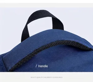 Close-up of the durable dual handle design on a blue student schoolbag for better carrying comfort