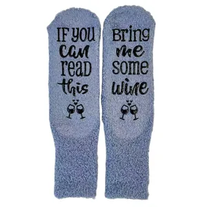 Thick blue coral fleece floor socks featuring non-slip Bring Me Some Wine lettering