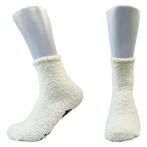 Cozy thick coral fleece floor socks featuring non-slip star grip patterns on soles