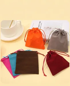 Group of multi-colored soft velvet drawstring pouches for jewelry and accessories