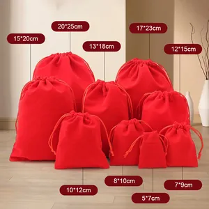 Red velvet drawstring pouches in multiple sizes for jewelry storage and gift packaging