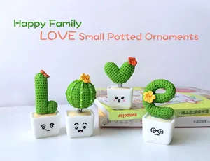 Detailed view of creative LOVE letter shaped cactus potted ornaments for desktop and car decor