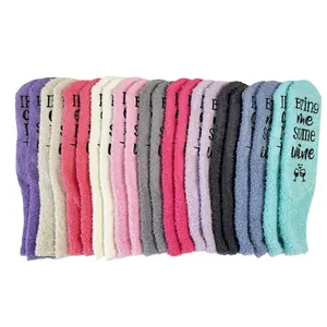 Cozy thickened coral fleece floor socks featuring non-slip Bring Me Wine text
