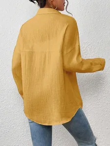Back view of mustard yellow drop shoulder long sleeve shirt with crinkled texture
