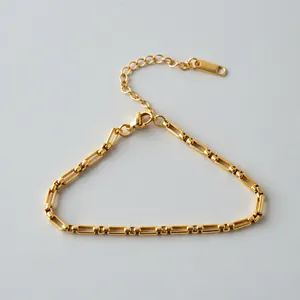 Elegant golden stainless steel bracelet with geometric rectangular links and lobster clasp.