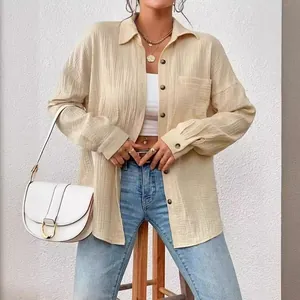 Casual women's beige drop shoulder long sleeve button-down shirt with chest pocket