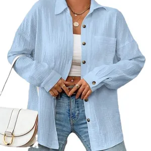 Relaxed light blue crinkle cotton long sleeve shirt with button-down front and pocket
